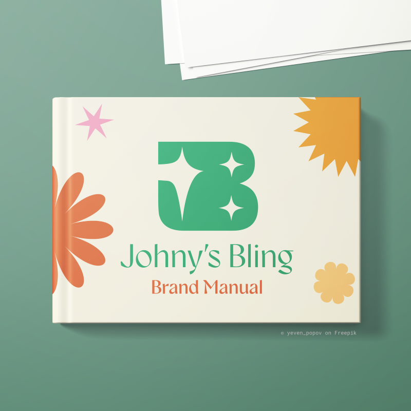 Mockup of the Johny's Bling Brand Manual, shot from straight down